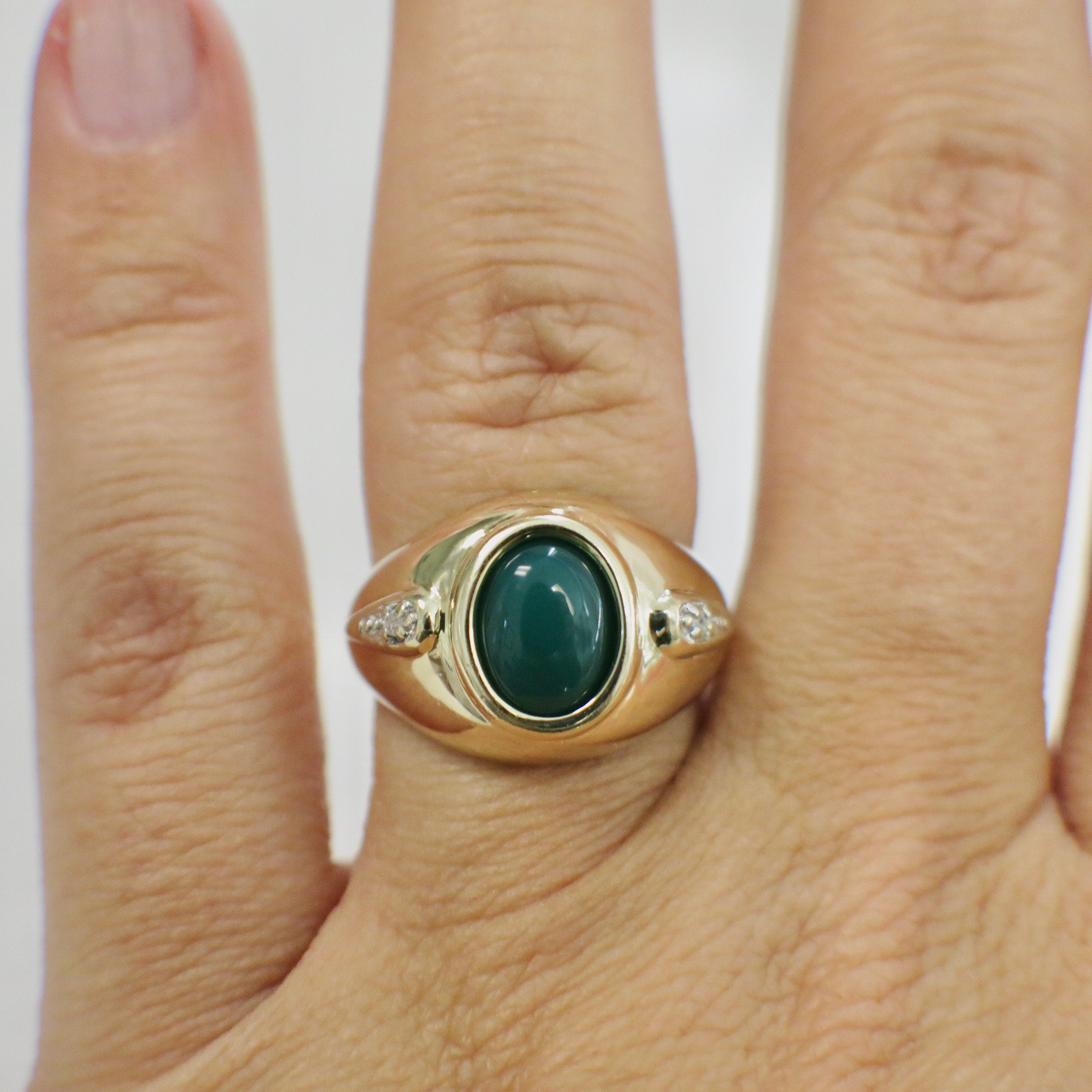14K yellow gold Chrysoprase cabochon ring with diamond accents, size 6, featuring a polished gemstone and elegant gold band.