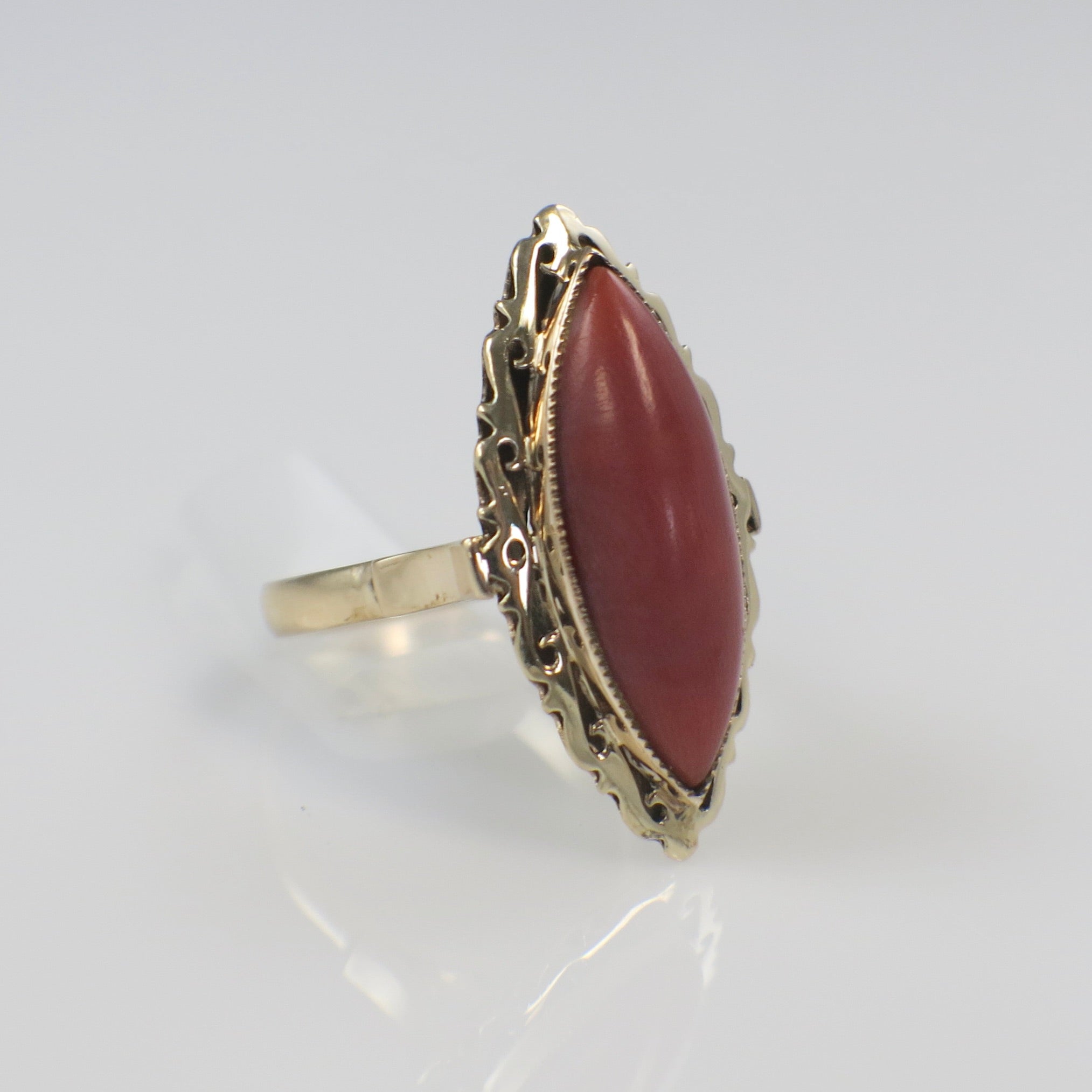 14K yellow gold vintage cocktail ring featuring a red jasper chalcedony cabochon, size 6.5, from Black Market LLC.