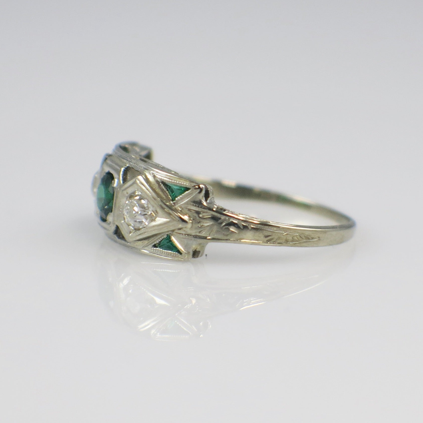 Vintage 14K white gold Art Deco ring with tsavorite garnet, diamonds, and old European cut diamonds by Black Market LLC.