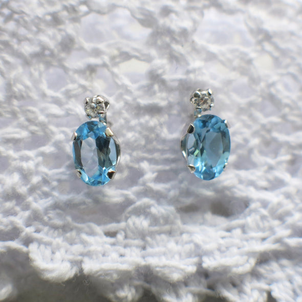 10K White Gold Oval Blue Topaz and CZ Stud Earrings