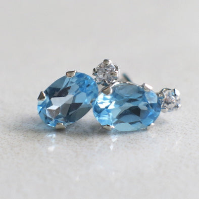 10K White Gold Oval Blue Topaz and CZ Stud Earrings