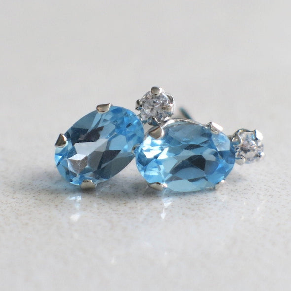 10K White Gold Oval Blue Topaz and CZ Stud Earrings