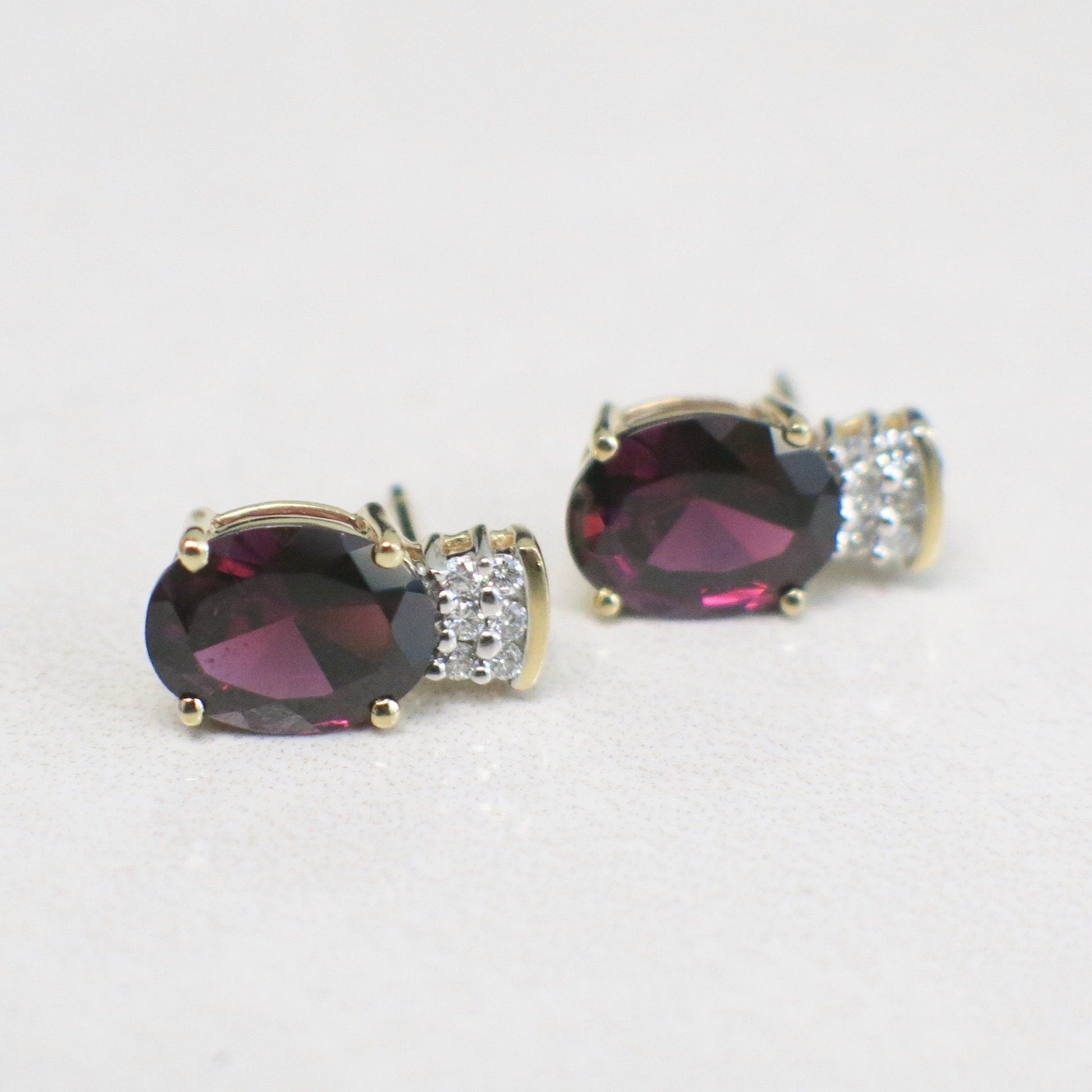 14K Yellow Gold Oval Rhodolite Garnet and Diamond Stud Earrings - Black Market LLC