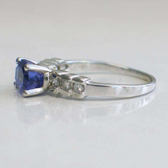 18K White Gold Tanzanite Set East to West With Diamond Accented Band