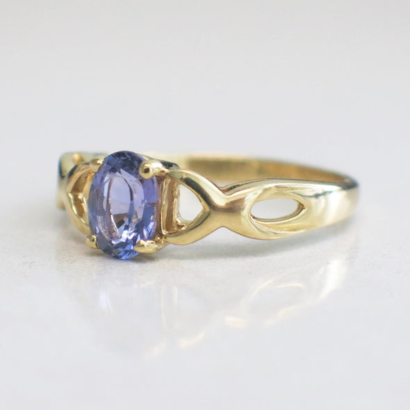 14K Yellow Gold Oval Tanzanite with Braided Criss-Cross Infinity Band Ring