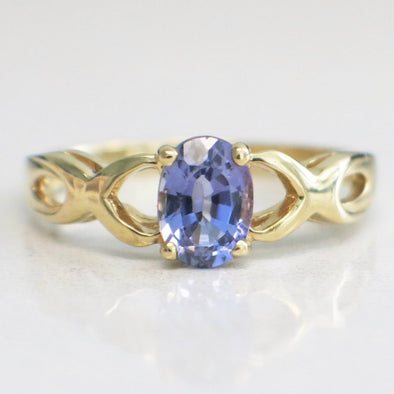 14K Yellow Gold Oval Tanzanite with Braided Criss-Cross Infinity Band Ring