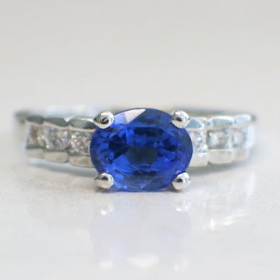 18K White Gold Tanzanite Set East to West With Diamond Accented Band