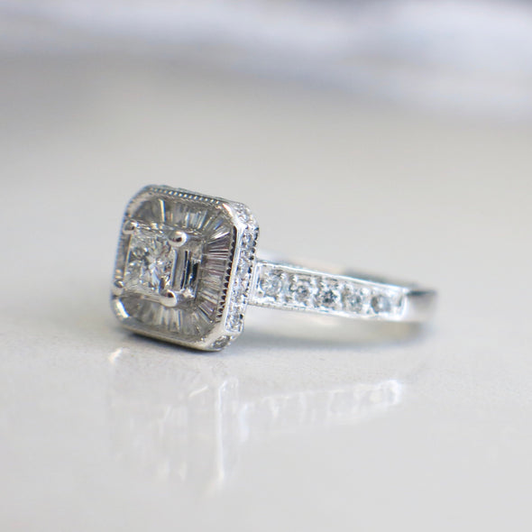 Princess Cut Diamond Engagement Ring with a Baguette Halo and Diamond Accented Band